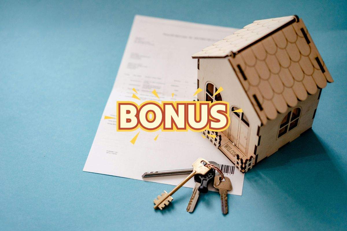 rappresentazione di un contratto di fitto e in primo piano scritta bonus